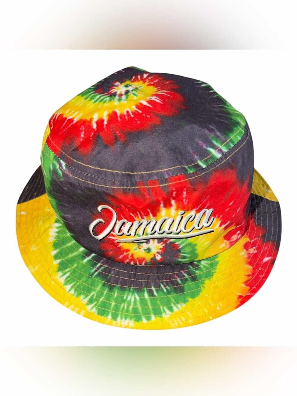 TBL tie dye bucket hat in rasta colors (black, red, green, yellow) with “Jamaica